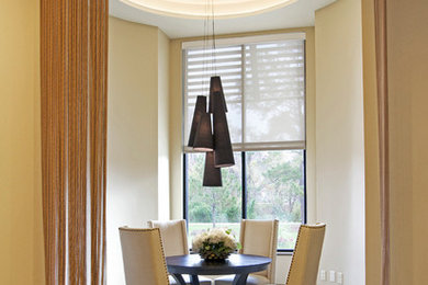 This is an example of a modern dining room in Houston.