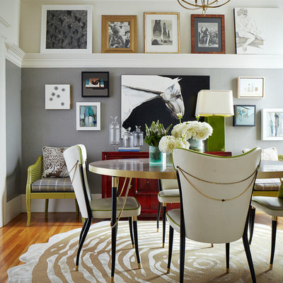 Inspiration for a mid-sized eclectic light wood floor and brown floor dining room remodel in San Francisco with gray walls and no fireplace