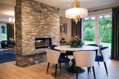 This is an example of a contemporary dining room in Belfast.