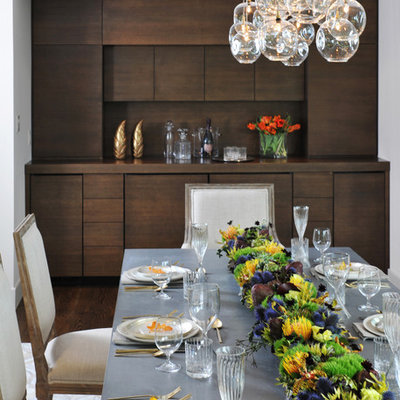 Enclosed dining room - large contemporary dark wood floor and brown floor enclosed dining room idea in San Francisco with beige walls