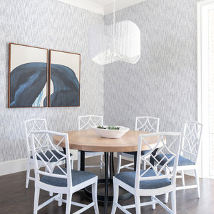 Example of a transitional dark wood floor and brown floor enclosed dining room design in Dallas with gray walls