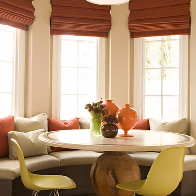 Dining room - transitional dark wood floor and brown floor dining room idea in Los Angeles with white walls