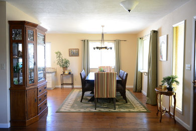 Example of a transitional medium tone wood floor dining room design in Sacramento