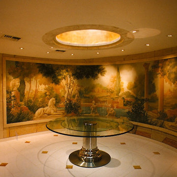 Curved dining room with Italian jungle ruins on Mural.