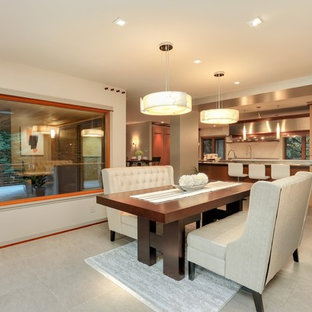 Trendy beige floor kitchen/dining room combo photo in Seattle with beige walls and no fireplace