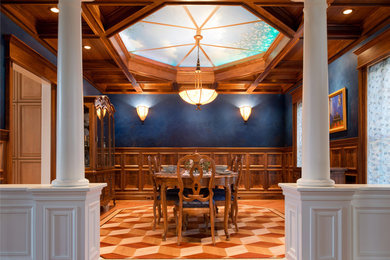 Inspiration for a mid-sized timeless dark wood floor and brown floor enclosed dining room remodel in Chicago with blue walls and no fireplace