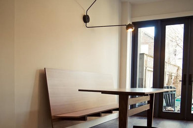 Example of a mid-sized minimalist dining room design in Toronto