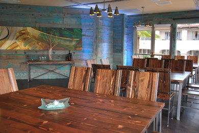 Example of a beach style dining room design in San Diego
