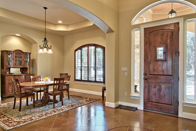 Example of a classic dining room design in Austin