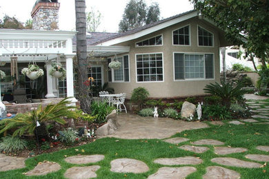 Inspiration for a transitional exterior home remodel in Orange County
