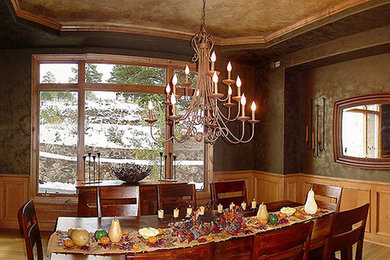 Example of an eclectic dining room design in St Louis