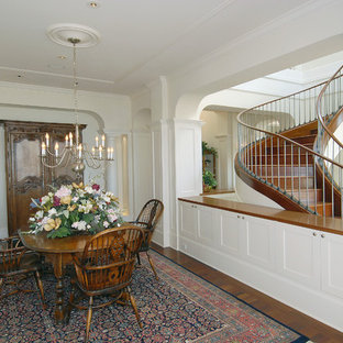 Elegant dark wood floor dining room photo in San Francisco with white walls