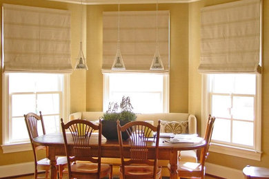 Inspiration for a mid-sized transitional brown floor kitchen/dining room combo remodel in Nashville with beige walls