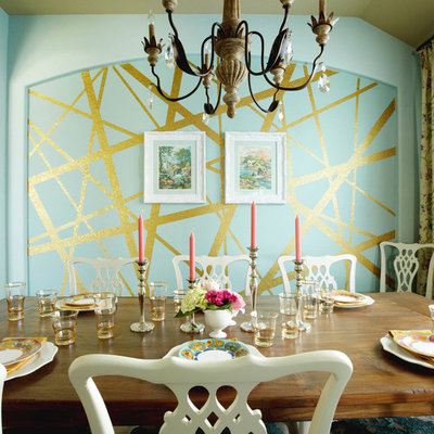 Inspiration for a mid-sized eclectic dark wood floor and brown floor enclosed dining room remodel in Houston with blue walls and no fireplace