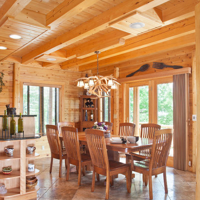 Mid-sized mountain style porcelain tile kitchen/dining room combo photo in DC Metro with brown walls
