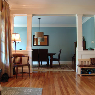 Inspiration for a craftsman medium tone wood floor dining room remodel in Atlanta with blue walls
