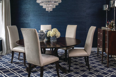 Mid-sized transitional carpeted and blue floor enclosed dining room photo in Boston with blue walls and no fireplace