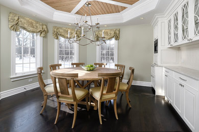 Example of a transitional dark wood floor dining room design in Chicago with gray walls and no fireplace