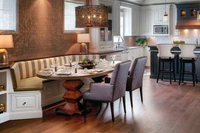 Example of a trendy kitchen/dining room combo design in Cleveland with no fireplace