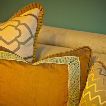 Detail of pillows on settee at dining table