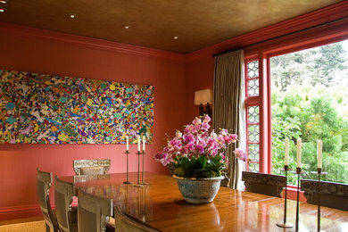 Inspiration for a large transitional enclosed dining room remodel in San Francisco with red walls