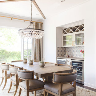 Dining room - transitional dark wood floor and brown floor dining room idea in San Diego with white walls and no fireplace