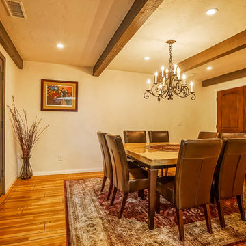 Dining area with Exposed Ceiling Joists.