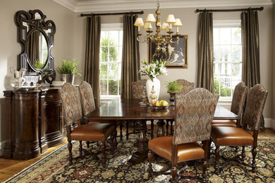 Medium sized traditional dining room in Other with beige walls, laminate floors, no fireplace and brown floors.