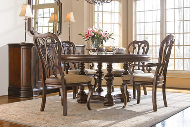 Inspiration for a large classic open plan dining room in Orlando with white walls and medium hardwood flooring.