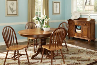 Inspiration for a mid-sized timeless dark wood floor enclosed dining room remodel in Columbus with blue walls