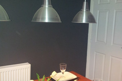This is an example of a contemporary dining room in Glasgow.
