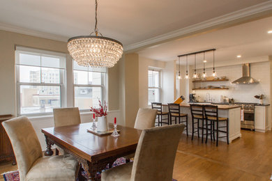 Elegant light wood floor kitchen/dining room combo photo in Chicago with white walls and no fireplace