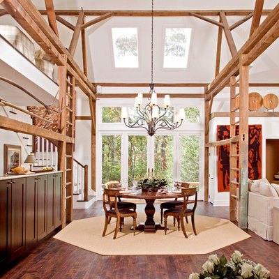Inspiration for a large farmhouse dark wood floor great room remodel in Philadelphia with white walls