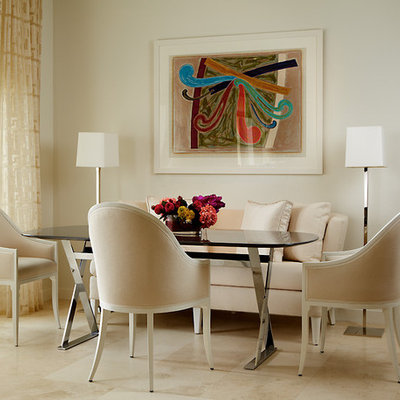 Inspiration for a contemporary dining room remodel in Miami with white walls