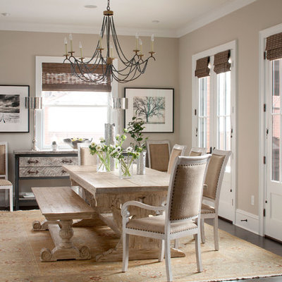 Example of a classic dark wood floor dining room design in Denver with beige walls