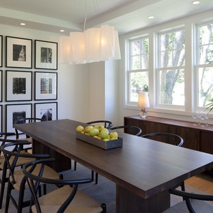 Transitional medium tone wood floor and beige floor dining room photo in Minneapolis with white walls