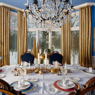 Dining Room Featuring Floor to Ceiling Bowed Windows and Crystal Chandelier