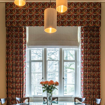 Dining room in historic house with beautiful big windows