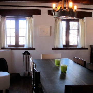 Dining room, kiva fireplace , hand carved woodwork