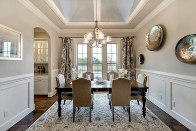 Example of a transitional dining room design in Other