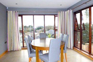 This is an example of a contemporary dining room in Belfast.