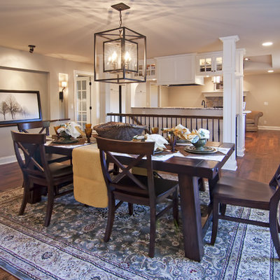 Example of a classic dark wood floor dining room design in Minneapolis with beige walls