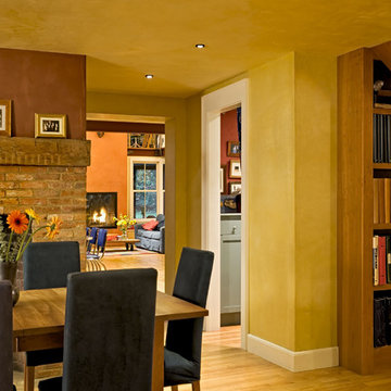 Dining room showing bookcase under staircase