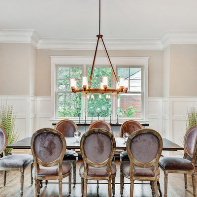 Example of a mid-sized transitional dark wood floor and brown floor enclosed dining room design in DC Metro with beige walls and no fireplace