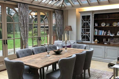 Design ideas for a classic enclosed dining room in Oxfordshire with feature lighting.