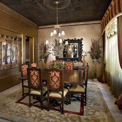 Inspiration for a mediterranean enclosed dining room remodel in Phoenix with brown walls