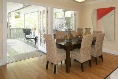 Dining Room with 2 sets of outswing French Doors to large deck