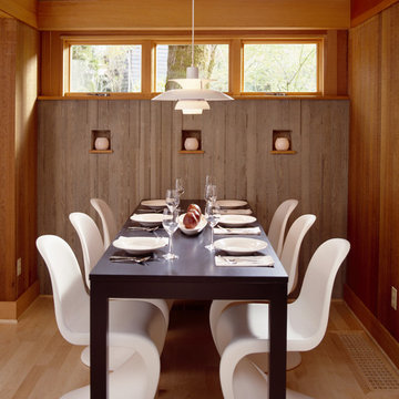 Dining Room with Board Formed Concrete Walls