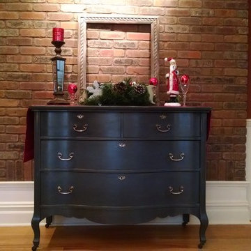 Dining room with brick accent wall.