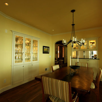 Dining Room with Built in Storage with White Shaker Cabinets and Leaded Glass Do